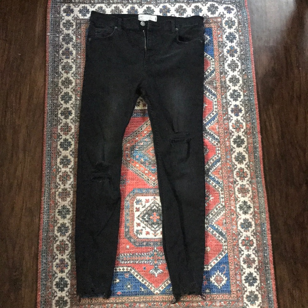 Free People black ripped skinny jeans. Size 29R